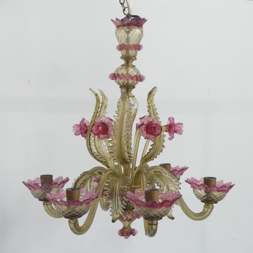 695 - A 20th century Venetian Glass pink and gold-tinted Chandelier, with six scrolled branches, daffodils... 