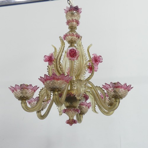 695 - A 20th century Venetian Glass pink and gold-tinted Chandelier, with six scrolled branches, daffodils... 