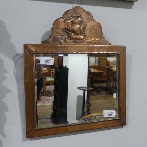 507 - An Arts and Crafts copper wall Mirror, in the manner of Newlyn, embossed pediment depicting ship, W ... 