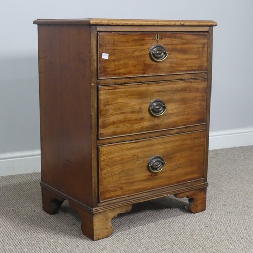 505 - An Edwardian mahogany bedside Chest of drawers, with three drawers raised on bracket feet, W 56.5 cm... 