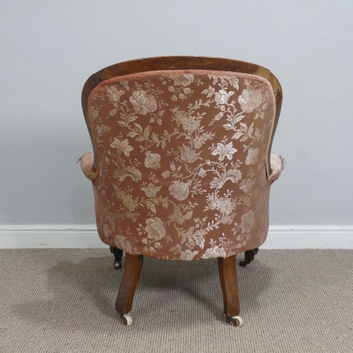 510 - A Victorian mahogany show-frame button-back Armchair, the arched top over serpentine front seat, fla... 