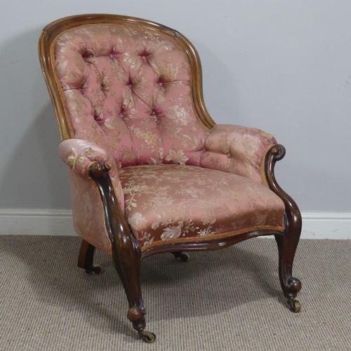 510 - A Victorian mahogany show-frame button-back Armchair, the arched top over serpentine front seat, fla... 