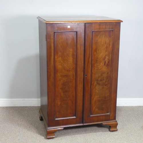 512 - A 19thC flame mahogany Linen Press/Cupboard, of small proportions, two cupboard doors concealing thr... 