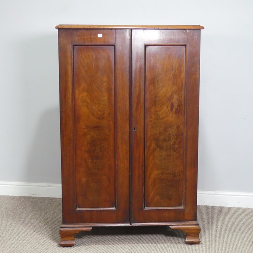 512 - A 19thC flame mahogany Linen Press/Cupboard, of small proportions, two cupboard doors concealing thr... 