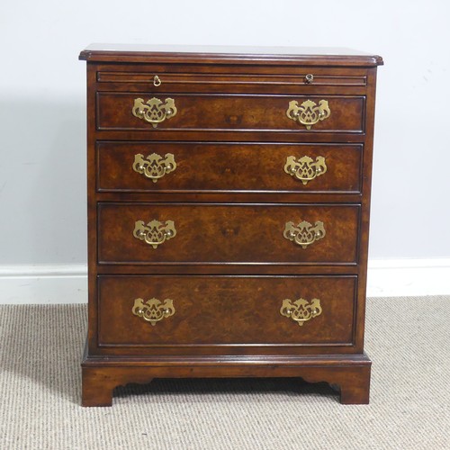 521 - A small reproduction burr walnut and mahogany Chest of drawers, with brushing slide over four gradua... 