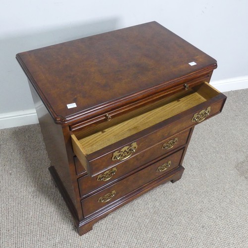 521 - A small reproduction burr walnut and mahogany Chest of drawers, with brushing slide over four gradua... 