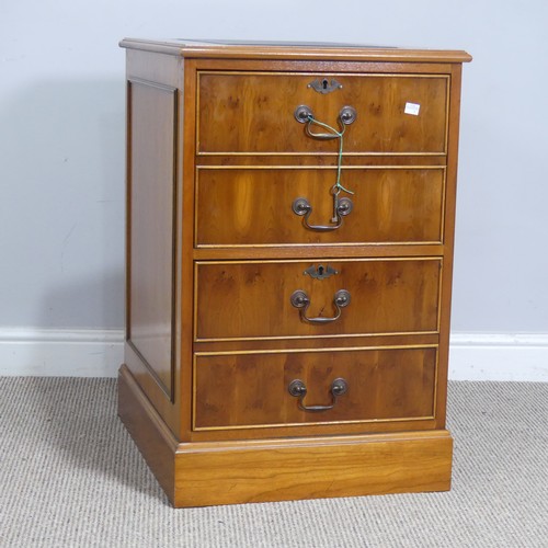 525 - A Brights of Nettlebed hardwood pedestal Desk, the top inset with a three sectional gilt tooled leat... 