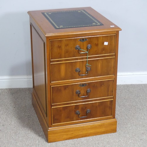 525 - A Brights of Nettlebed hardwood pedestal Desk, the top inset with a three sectional gilt tooled leat... 