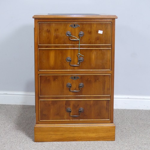 525 - A Brights of Nettlebed hardwood pedestal Desk, the top inset with a three sectional gilt tooled leat... 