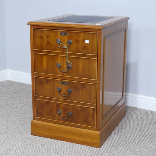 525 - A Brights of Nettlebed hardwood pedestal Desk, the top inset with a three sectional gilt tooled leat... 