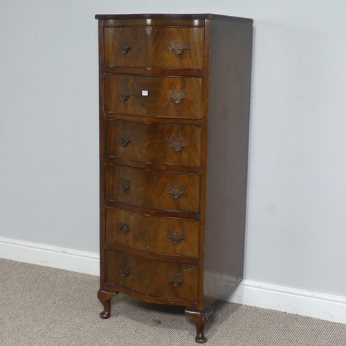 527 - A tall reproduction mahogany Chest of drawers, the serpentine front with six drawers, raised on cabr... 