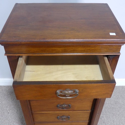 528 - An Edwardian oak Wellington Chest of seven drawers, the drawers mounted with Arts and Crafts style c... 