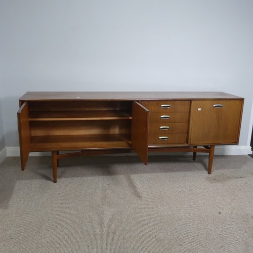 530 - A mid-20th century G-plan teak Sideboard, by E. Gomme, comprising of three cupboards ad four drawers... 