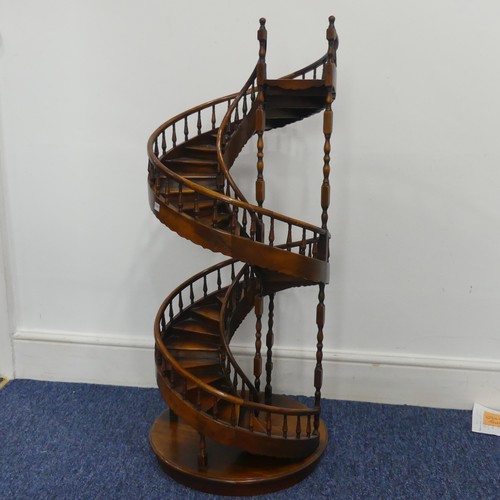 540 - A large fruitwood architectural model of a spiral Staircase, possibly by Theodore Alexander, possibl... 