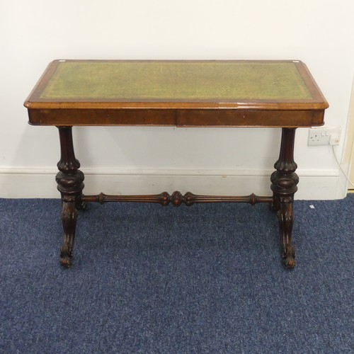 541 - A 19th century burr walnut Library Table, of small proportions, the moulded rectangular top inset wi... 