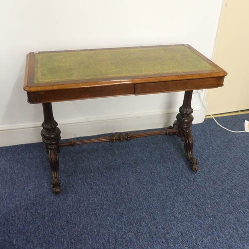 541 - A 19th century burr walnut Library Table, of small proportions, the moulded rectangular top inset wi... 