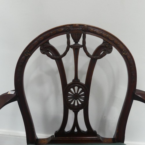 543 - A 19th century Adam style mahogany carved open Armchair, the arched back with pediment swags issuing... 