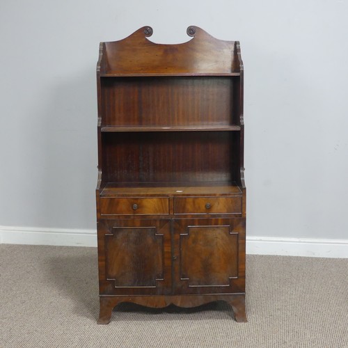 564 - A regency style mahogany open waterfall Bookcase, the scrolled pediment over shelves, drawers and cu... 