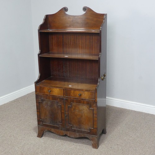 564 - A regency style mahogany open waterfall Bookcase, the scrolled pediment over shelves, drawers and cu... 