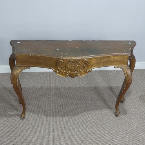 568 - A 19th century inspired gilt painted side / console Table, the shaped top over carved foliate frieze... 