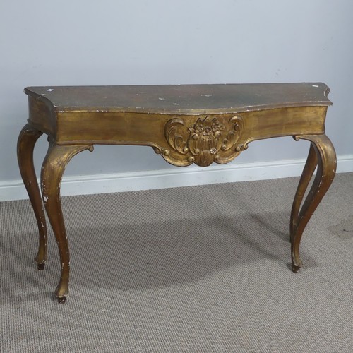 568 - A 19th century inspired gilt painted side / console Table, the shaped top over carved foliate frieze... 