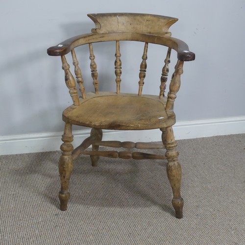 547 - An early 20th century ash and elm smokers bow Armchair, raised on turned supports, W 63.5 cm x H 80 ... 