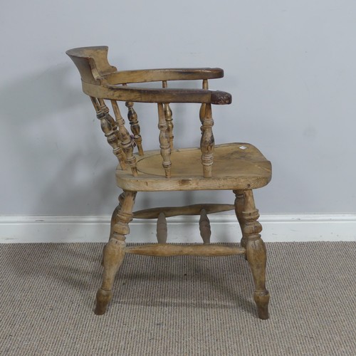 547 - An early 20th century ash and elm smokers bow Armchair, raised on turned supports, W 63.5 cm x H 80 ... 