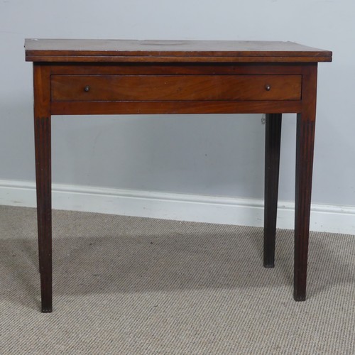 548 - A Georgian mahogany tea Table, the rectangular top over singular frieze drawer, raised on tapering r... 