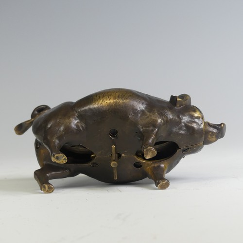 553 - An early 20th century brass butchers countertop Bell, in the form of a pig, inset with glass eyes an... 