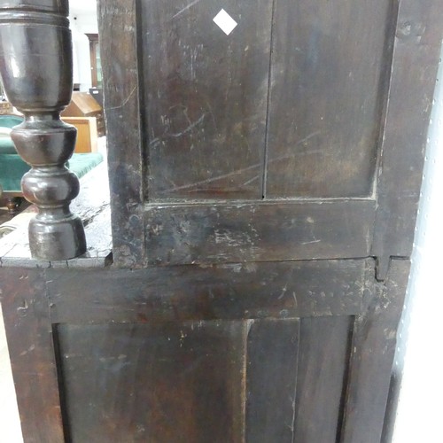 537 - A 17th century carved oak court Cupboard, the cornice with carved details and 'WBEB' raised on bulbo... 