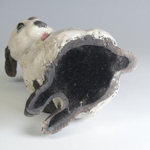 366 - Keza Rudge (British 20th century) a studio pottery Raku Rabbit, modelled in seated position with tur... 