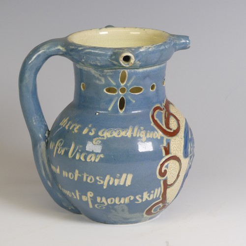 379 - A C. H. Brannam Barum pottery puzzle Jug, decorated with fish and motto, inscribed marks to base 'C.... 