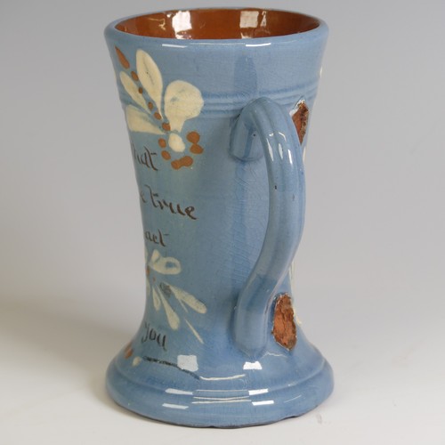 381 - A C. H. Brannam pottery Vase, having a singular swirled handle and decorated with fish, inscribed ma... 