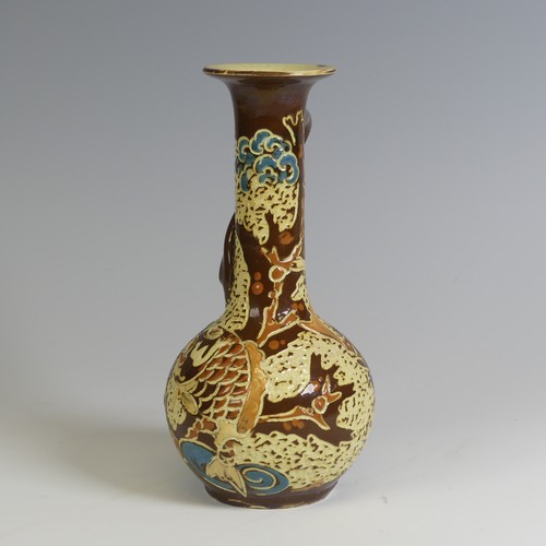 381 - A C. H. Brannam pottery Vase, having a singular swirled handle and decorated with fish, inscribed ma... 