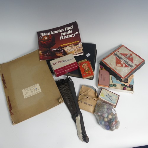 210 - A quantity of interesting collectors' items, including W.W.I compass and case, another compass small... 