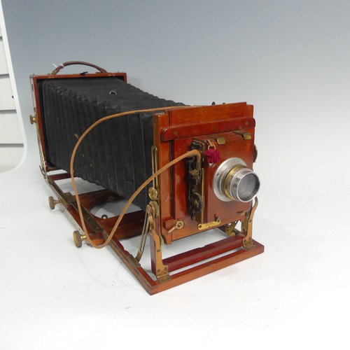 221 - Houghton's ‘Victo’ folding half-plate hand and stand field Camera, mahogany and brass, with Thornton... 