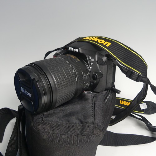 244 - Cameras: A Nikon D5300 with Nikkor 18-140mm f.3.5-5.6 telephoto lens, together with three compact di... 