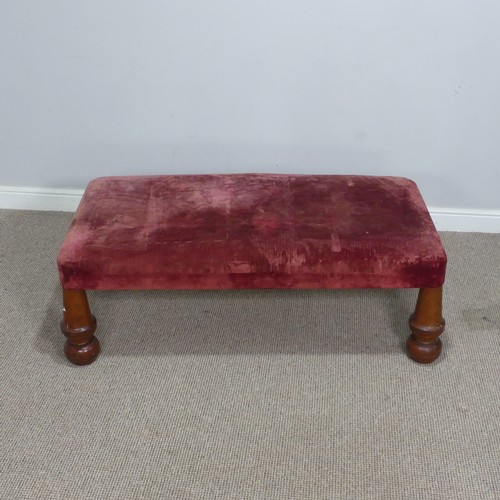 565 - A large antique upholstered Stool, raised on four bulbous turned supports, W 130 cm x H 44 cm x D 68... 