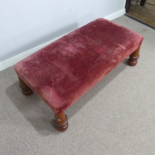 565 - A large antique upholstered Stool, raised on four bulbous turned supports, W 130 cm x H 44 cm x D 68... 