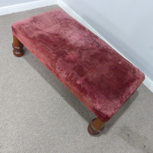 565 - A large antique upholstered Stool, raised on four bulbous turned supports, W 130 cm x H 44 cm x D 68... 