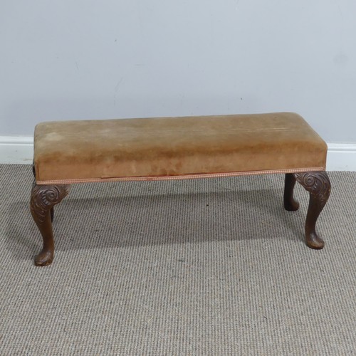 565 - A large antique upholstered Stool, raised on four bulbous turned supports, W 130 cm x H 44 cm x D 68... 