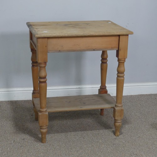 563 - An antique pine side Table, the rectangular top raised on turned supports and under tier, W 63 cm x ... 