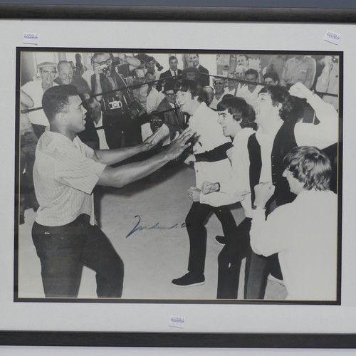 277 - Sporting Interest; a black and white photograph of Muhammad Ali and The Beatles, signed in marker pe... 