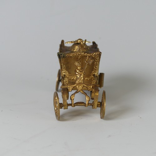 514 - An early 20th Century novelty tape Measure, in the form of a gilt metal Coronation Coach/Carriage, w... 