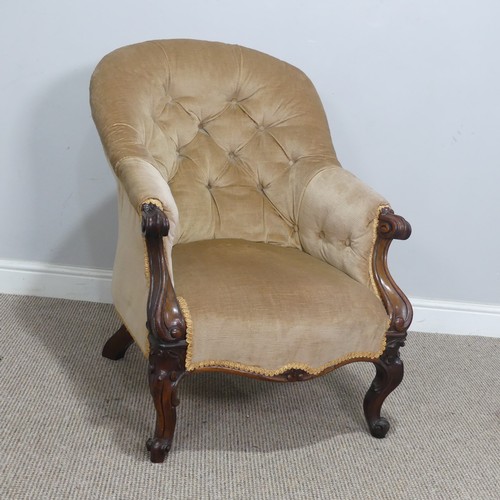 569 - A Victorian mahogany upholstered button-back Armchair, with scrolled armrests and supports, W 62 cm ... 