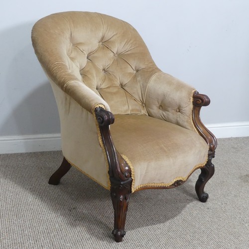 569 - A Victorian mahogany upholstered button-back Armchair, with scrolled armrests and supports, W 62 cm ... 