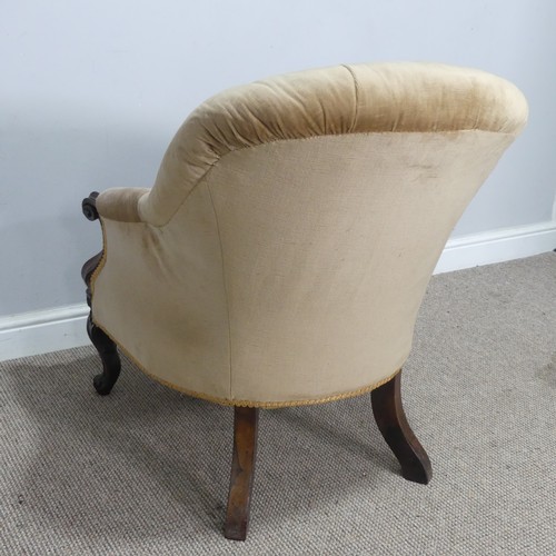 569 - A Victorian mahogany upholstered button-back Armchair, with scrolled armrests and supports, W 62 cm ... 