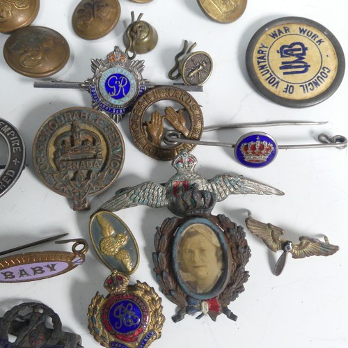 203 - A collection of twenty-six various pin/lapel badges, including some military, silver Royal Army Serv... 