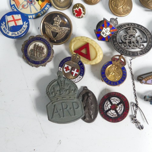 203 - A collection of twenty-six various pin/lapel badges, including some military, silver Royal Army Serv... 