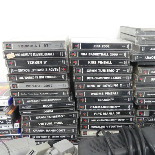 240 - A Large selection of Sony PlayStation, including; PlayStation One, seven controllers, Falcon pistol ... 